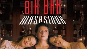 İki Kent Arasında Bir Bar Masasında